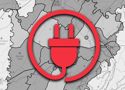 A red plug icon is superimposed on a grayscale map featuring regional boundaries and locations, including Johnson City and Murphy Field.